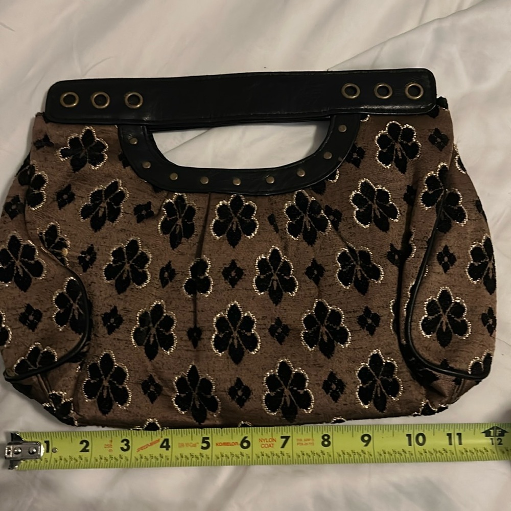 Clutch black and gold clutch never used.